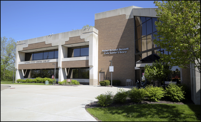 exterior of the robert and janet bennett civic center library building with entrance and landscaping in view